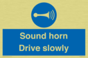 sound-horn-drive-slowly-warehousing-and-delivery-sign~